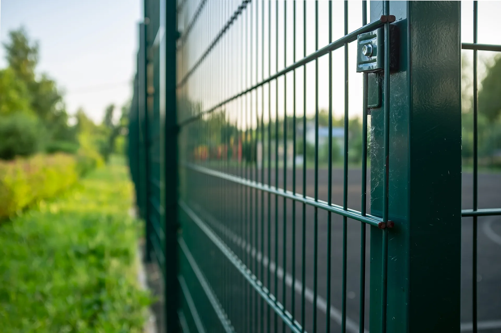 Protected green metal fence